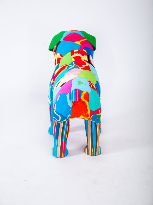 Colorful dog-shaped object on a white background