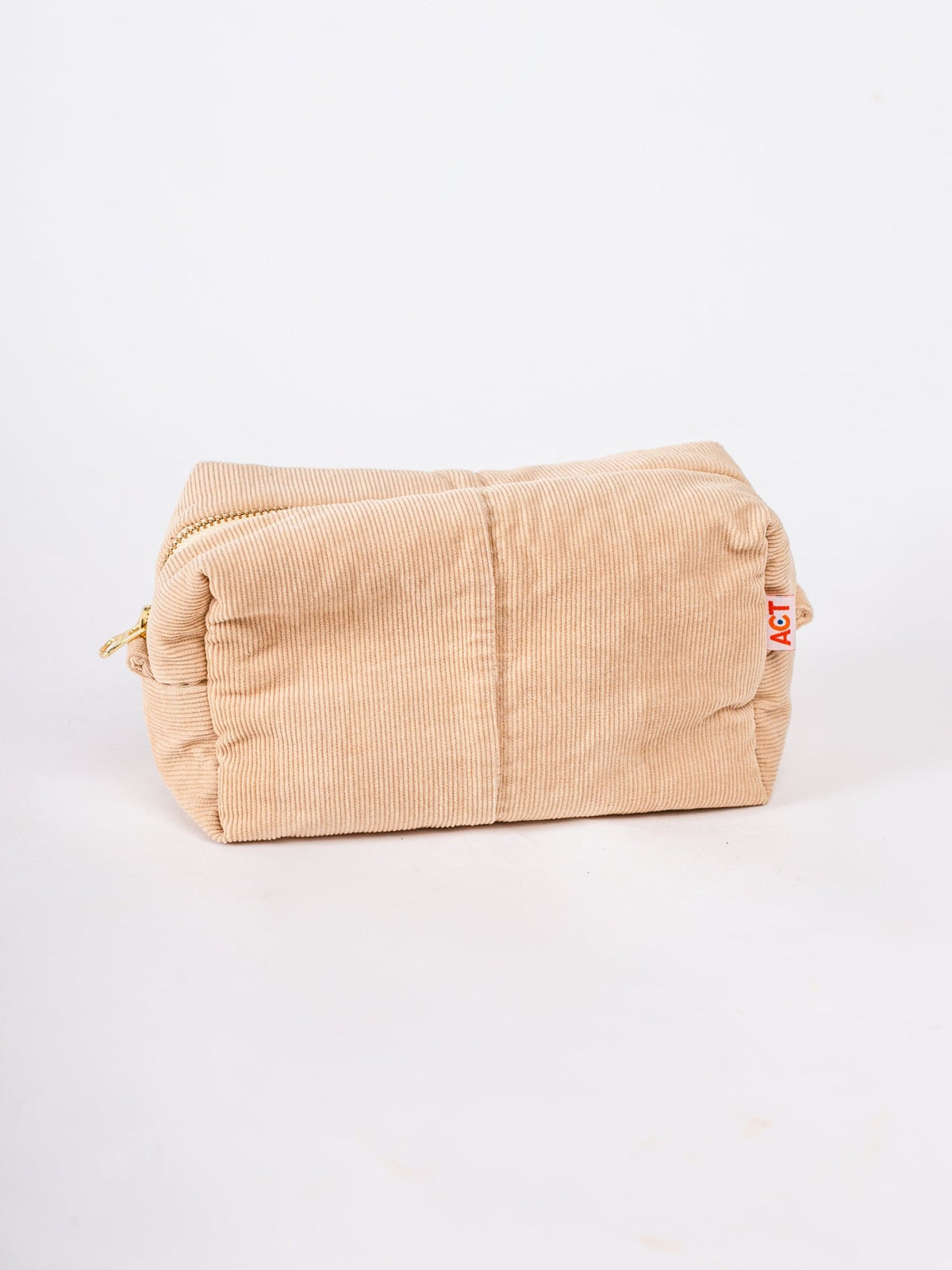 Beige corduroy pouch with a zipper on a white background