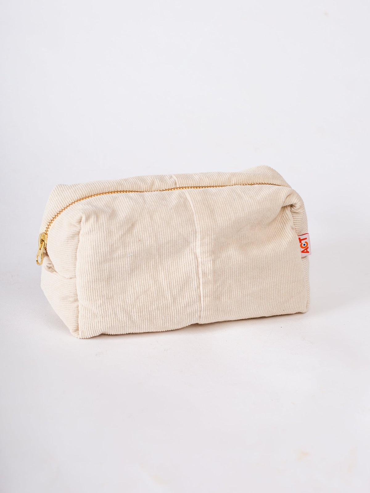 Beige toiletry bag with a brand logo on a white background