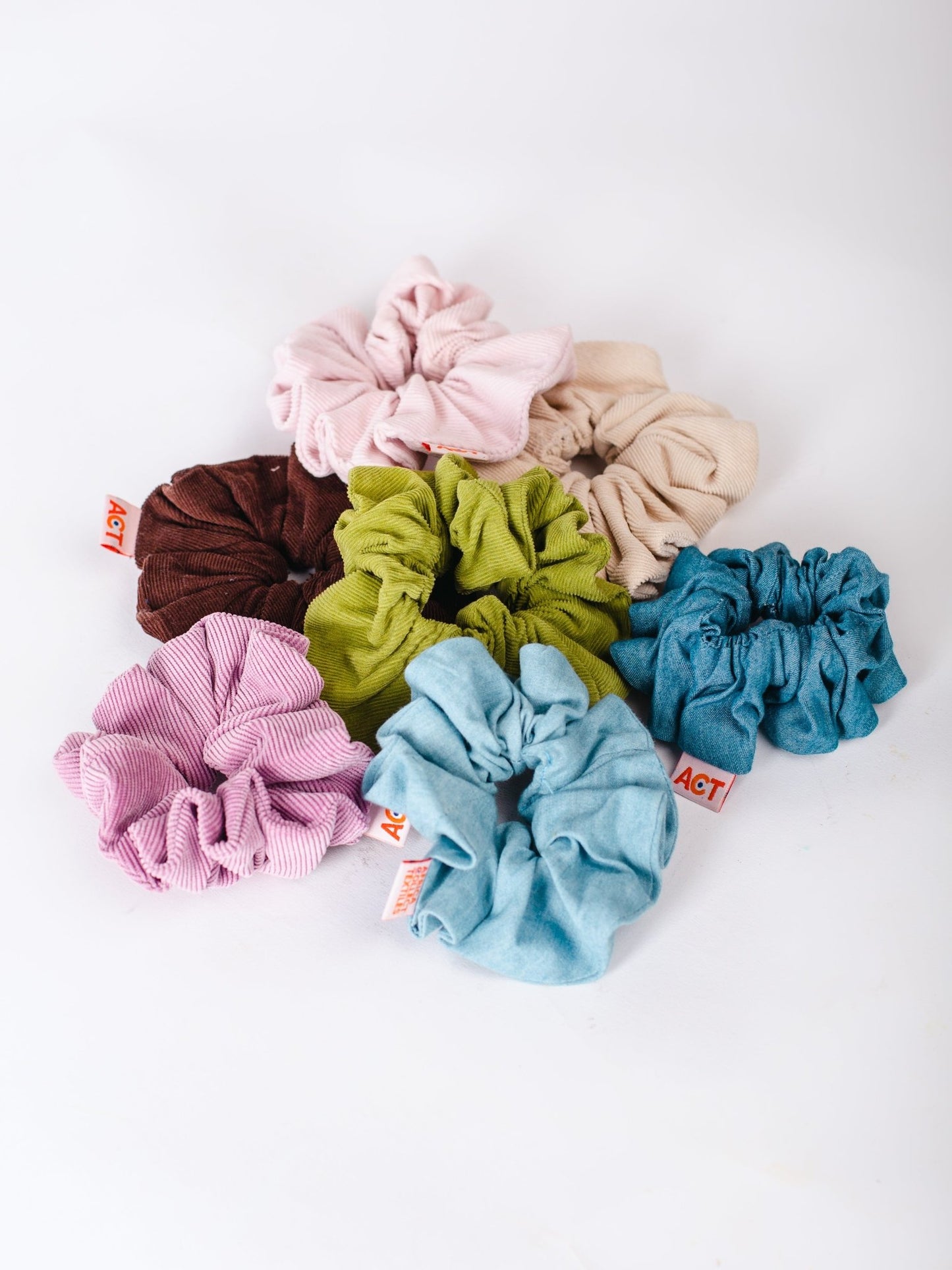 Set of colorful scrunchies on a white background